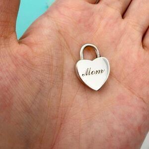 Tiffany & Co. Vguc mom lock in sterling silver